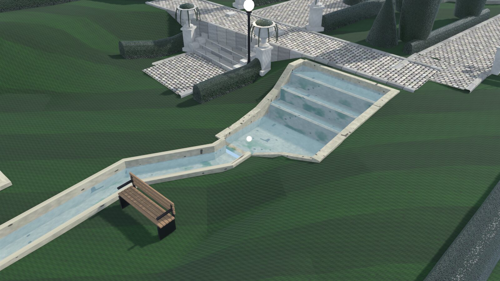 Stone stairs and lawns running down to the water