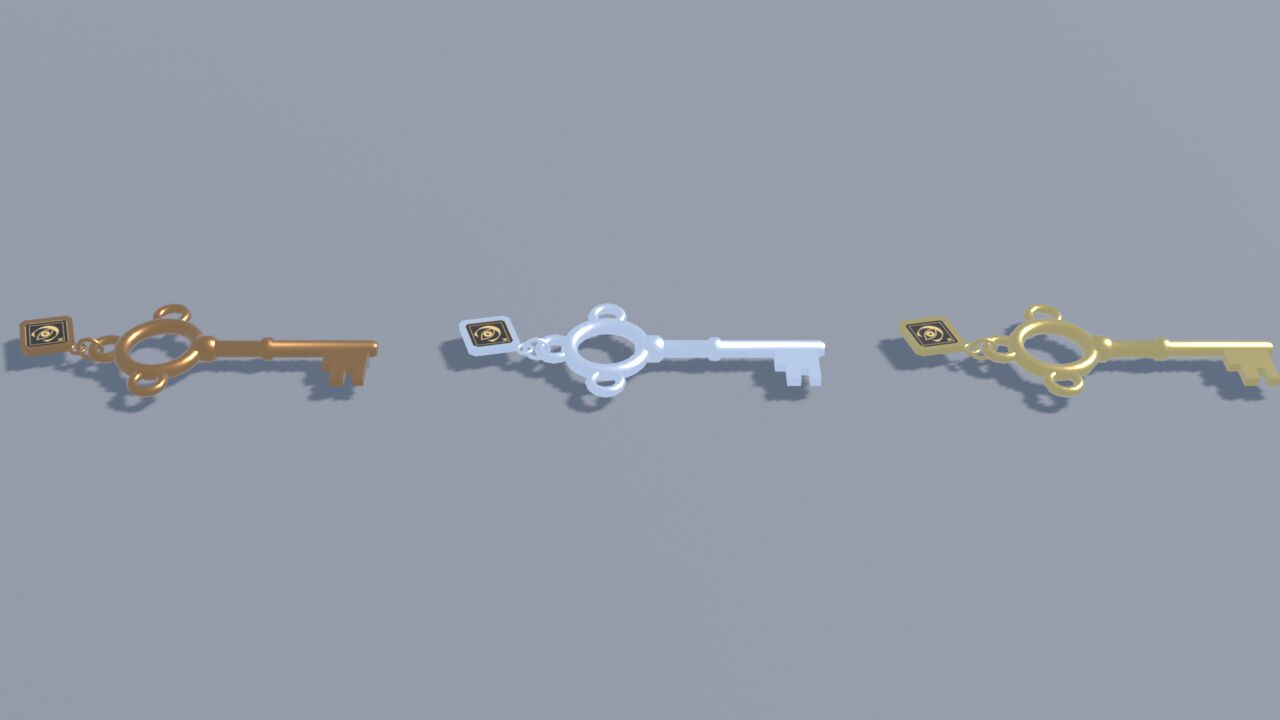 Three ornate keys in bronze, silver and gold