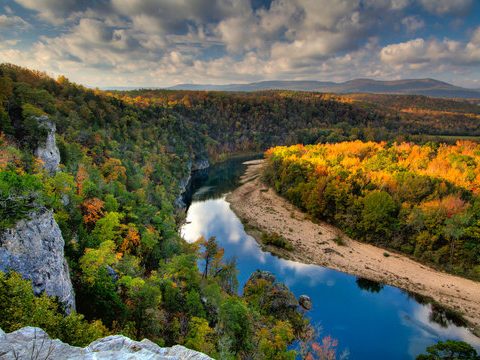 Autumn forest canyon with river bluffs in the Ozarks